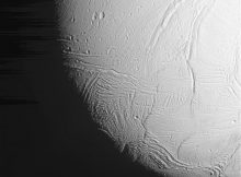 The south polar region of Saturn's active, icy moon Enceladus awaits NASA's Cassini spacecraft in this view, acquired on approach to the mission's deepest-ever dive through the moon's plume of icy spray. Credits: NASA/JPL-Caltech/Space Science Institute