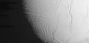 The south polar region of Saturn's active, icy moon Enceladus awaits NASA's Cassini spacecraft in this view, acquired on approach to the mission's deepest-ever dive through the moon's plume of icy spray. Credits: NASA/JPL-Caltech/Space Science Institute