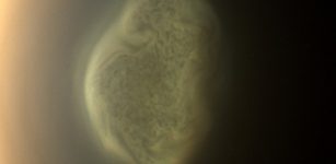 This 2012 close-up offers an early snapshot of the changes taking place at Titan’s south pole. Cassini’s camera spotted this impressive cloud hovering at an altitude of about 186 miles (300 kilometers). Cassini’s thermal infrared instrument has now detected a massive ice cloud below it. Credits: NASA/JPL-Caltech/Space Science Institute