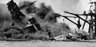 A U.S. battleship sinks during the Japanese attack on Pearl Harbor, Hawaii, in 1941. Credits: National Archives, Washington, D.C.