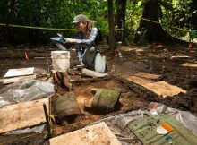 University of Washington Ph.D student Anna Cohen excavates stone bowls at the Valley of the Jaguars site in Honduras. PHOTOGRAPH BY DAVID YODER, NATIONAL GEOGRAPHIC