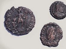 A total of 26 4th century Roman bronze coins were found in one of the three graves. Photo: PressTV