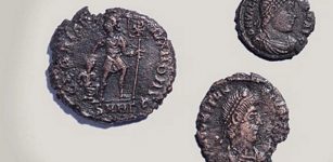 A total of 26 4th century Roman bronze coins were found in one of the three graves. Photo: PressTV