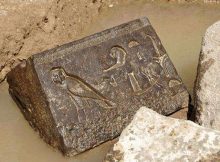 A carved basalt block, a piece that belongs to the bottom part of a chapel belonging to King Nectanebo I.