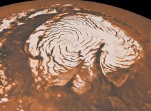 The north polar ice cap of Mars is seen in this mosaic view, which scientists made by combining data from the European Mars Express spacecraft and NASA's Mars Reconnaissance Orbiter. The spiral features help scientists understand how ice ages on Mars work. Credit: ESA/DLR/FU-Berlin/Ralf Jaumann