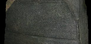 The Rosetta Stone in the British Museum. Image via Wikipedia