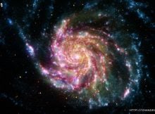 The Pinwheel Galaxy is in the constellation of Ursa Major (also known as the Big Dipper). It is about 70 percent larger than our own Milky Way Galaxy, with a diameter of about 170,000 light years, and sits at a distance of 21 million light years from Earth. This means that the light we're seeing in this image left the Pinwheel Galaxy about 21 million years ago - many millions of years before humans ever walked the Earth. Image Credits: X-ray: NASA/CXC/SAO; IR & UV: NASA/JPL-Caltech; Optical: NASA/STScI