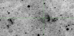 Crosshairs indicate the location of the nova studied. Remnant can be seen as a partial arc to the right of the nova.