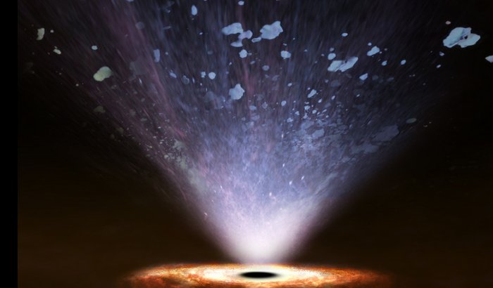 Artist's impression showing how ultrafast winds blowing from a supermassive black hole interact with interstellar matter in the host galaxy, clearing its central regions from gas. ESA/ATG medialab