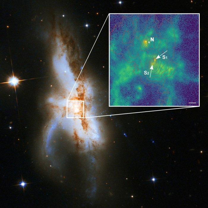 Three Supermassive Black Holes - Each With A Mass Of 90 Million Suns Discovered In Irregular Galaxy NGC 6240