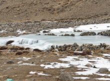 Aufeis formation in the area of a flat valley section below a springshed at 4,400 meters