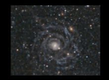 The giant, low surface brightness galaxy Malin 1 as imaged by the Megacam instrument on the 6.5m Magellan/Clay telescope.