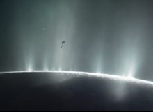 This artist's impression depicts NASA's Cassini spacecraft flying through a plume of presumed water erupting from the surface of Saturn's moon Enceladus