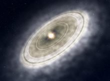 An artist's impression of a star's dusty debris disk, thought to be produced when asteroids or other planetesimals collide and fragment. Astronomers studying the debris disk around the star HD 206893 have imaged a wide gap in the disk extending from about 50 to 185 au from the star. After modeling the system, they conclude it contains a 1.4 Jupiter-mass planet orbiting about 79 au from the central star. NAOJ