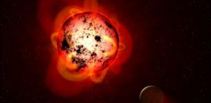 An illustration of a red dwarf star orbited by an exoplanet. Credits:Credit: NASA/ESA/G. Bacon (STScI)