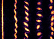 Just like the formation of weather patterns on Earth, here a spinning fluid of quantum particles breaks up into a crystal formed from swirling, tornado-like structures. Credit: Courtesy of the researchers