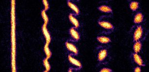 Just like the formation of weather patterns on Earth, here a spinning fluid of quantum particles breaks up into a crystal formed from swirling, tornado-like structures. Credit: Courtesy of the researchers