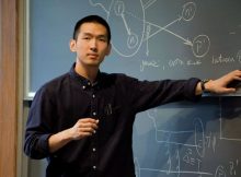 Zhoudunming Tu explains the science of exploring gluon distributions and deuteron breakup in ultra-peripheral collisions of deuterons and gold ions while speaking with a group of students at Princeton University. Credit: Yingshi Peng, Princeton