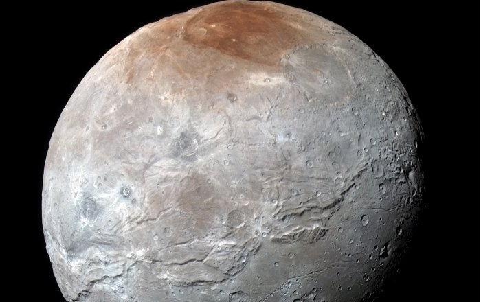 A Possible Source For Charon's Red Cap - Identified