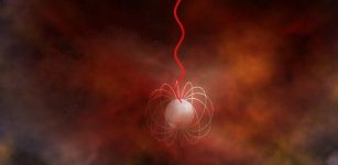 Artist's conception of a neutron star with an ultra-strong magnetic field, called a magnetar, emitting radio waves (red). Magnetars are a leading candidate for what generates Fast Radio Bursts. Credit: Bill Saxton, NRAO/AUI/NSF