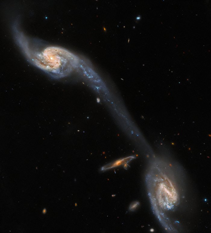 Hubble Inspects Two Galaxies Connected By A Luminous Bridge ...