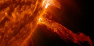 A NASA image of plasma bursting from the sun. Plasma—a hot soup of atoms with free moving electrons and ions—is the most abundant form of matter in the universe, found throughout our solar system in the sun and other planetary bodies. A new study from University of Rochester researchers provides experimental data about how radiation travels through dense plasmas, which will help scientists to better understand planetary science and fusion energy. (NASA image)