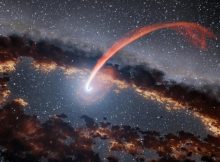 This illustration shows a glowing stream of material from a star as it is being devoured by a supermassive black hole in a tidal disruption flare. When a star passes within a certain distance of a black hole - close enough to be gravitationally disrupted - the stellar material gets stretched and compressed as it falls into the black hole. Credit: NASAJPL-Caltech