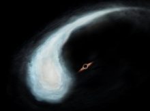 Artist's Impression of the “Tadpole” Molecular Cloud and the black hole at the gravitational center of its orbit. Credit: Keio University