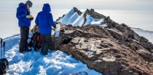 Collecting rocks on Månesigden mountain, in Heimefrontfjella. The polished surface of the rocks show that they have been covered by an ice layer. The researchers analysed the rocks for cosmogenic isotopes that can tell them how long it has been since the rocks were covered by ice. Carl (Calle) Lundberg is taking notes while PhD student Jenny Newall collects samples. Credit: Ola Fredin, NTNU