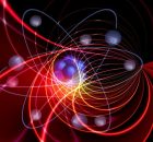 X-rays From Atomic Systems Could Provide New Insights Into Competing Quantum Theories